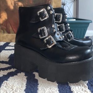 Black platform buckle shoes